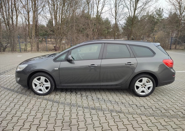 Opel Astra cena 24999 przebieg: 118000, rok produkcji 2011 z Puszczykowo małe 191